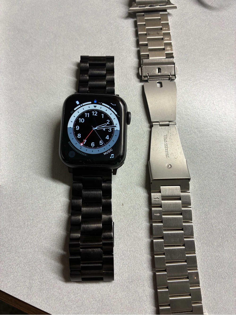 Apple Series 5 Black Smartwatch and also metal watchband as well